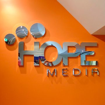 Office reception sign for Hope Media