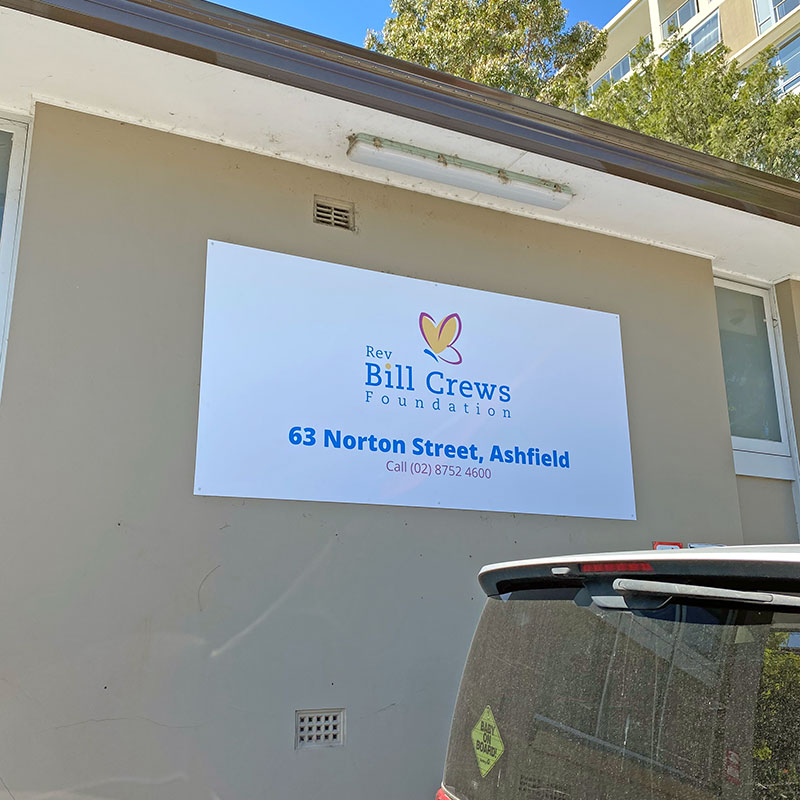 Bill Crews sign board with print