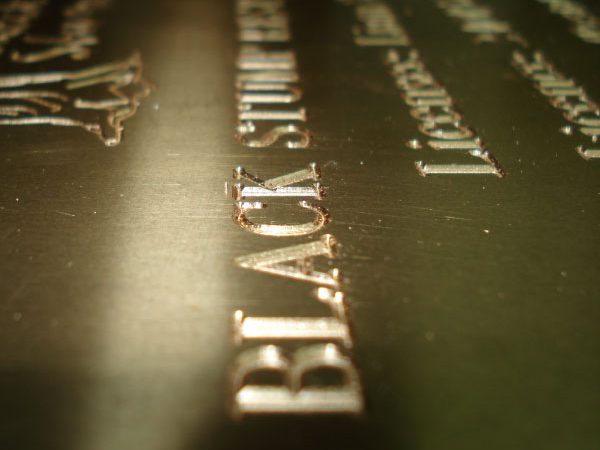 Close up of an engraved brass plaque
