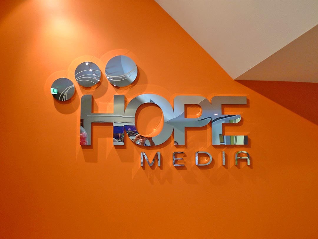 office reception sign reading "Hope Media"